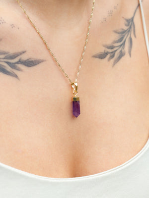 Amethist hanger aan gouden ketting